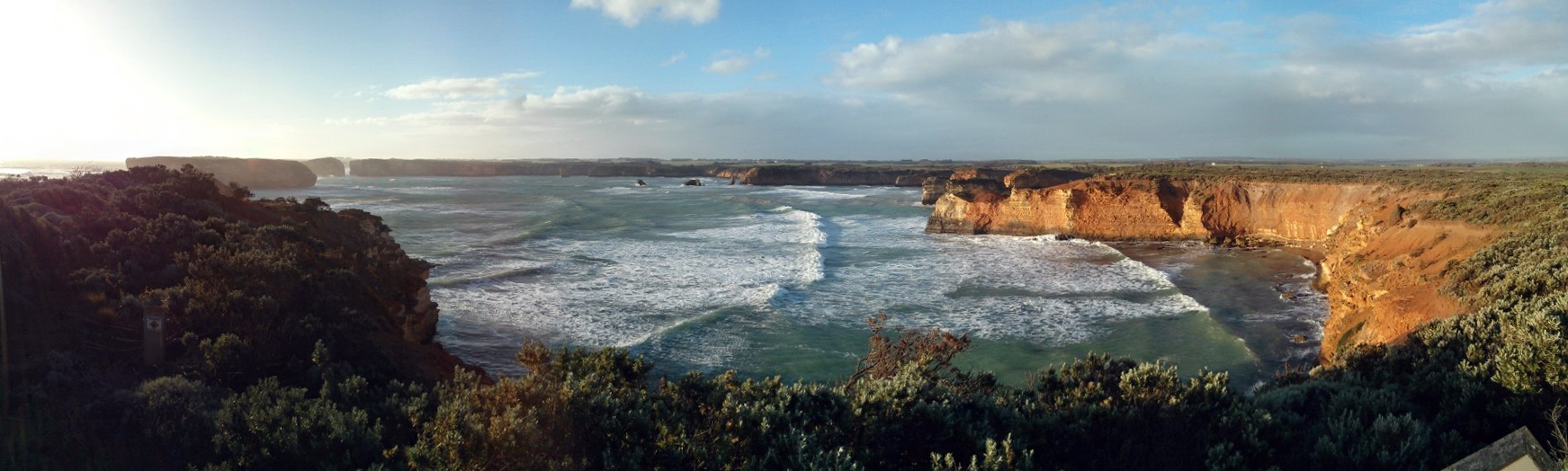 Panoramic view (from roughly W to NE) of a portion of the Bay of Islands, in the Bay of Islands Coastal Park on the Great Ocean Road, as viewed near sunset.