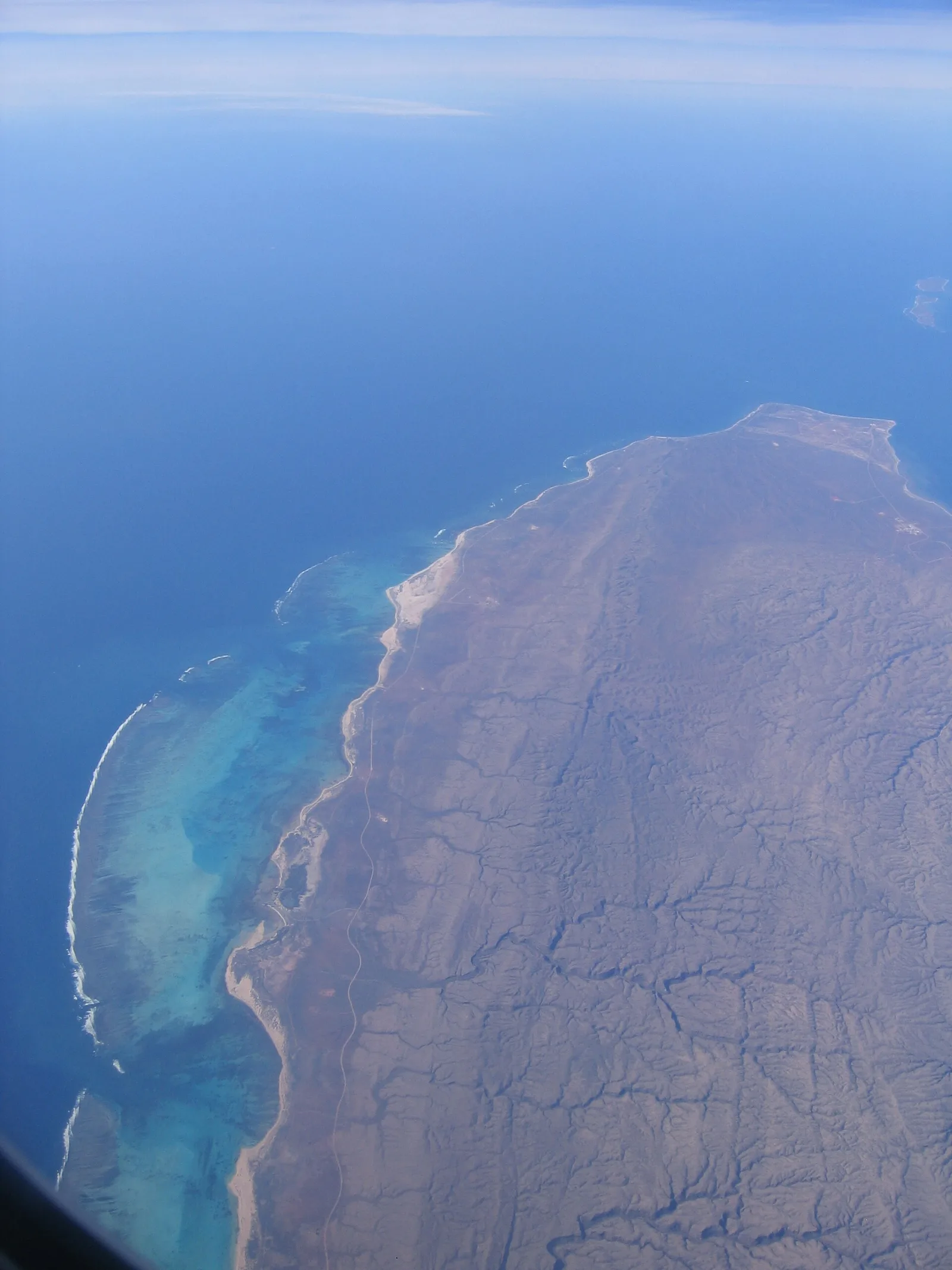 Cape Range National Park and Ningaloo Reef (Ningaloo Marine Park) from the air.
