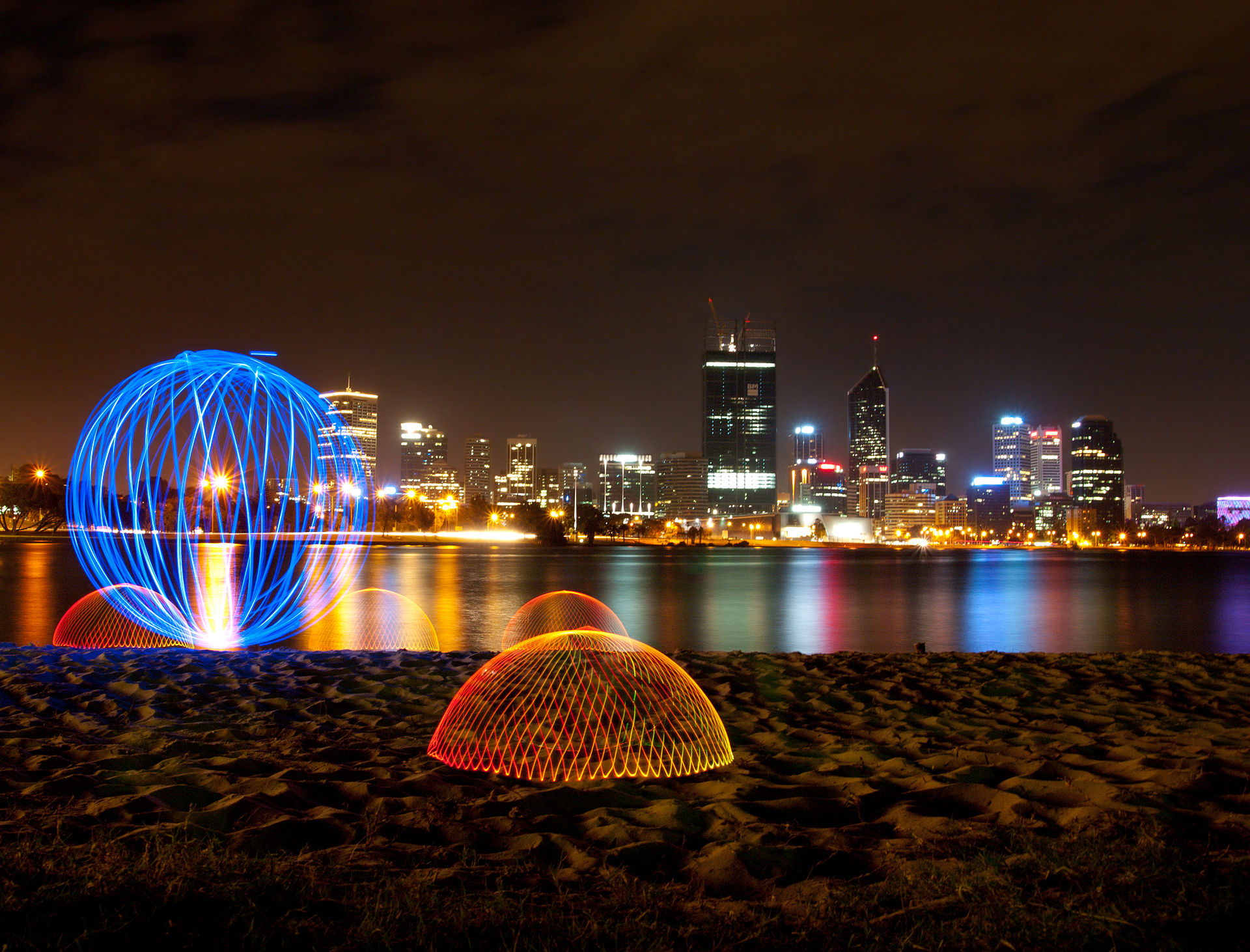 Light painting, orb and domes on the bank of the Swan River, Perth, Western Australia.